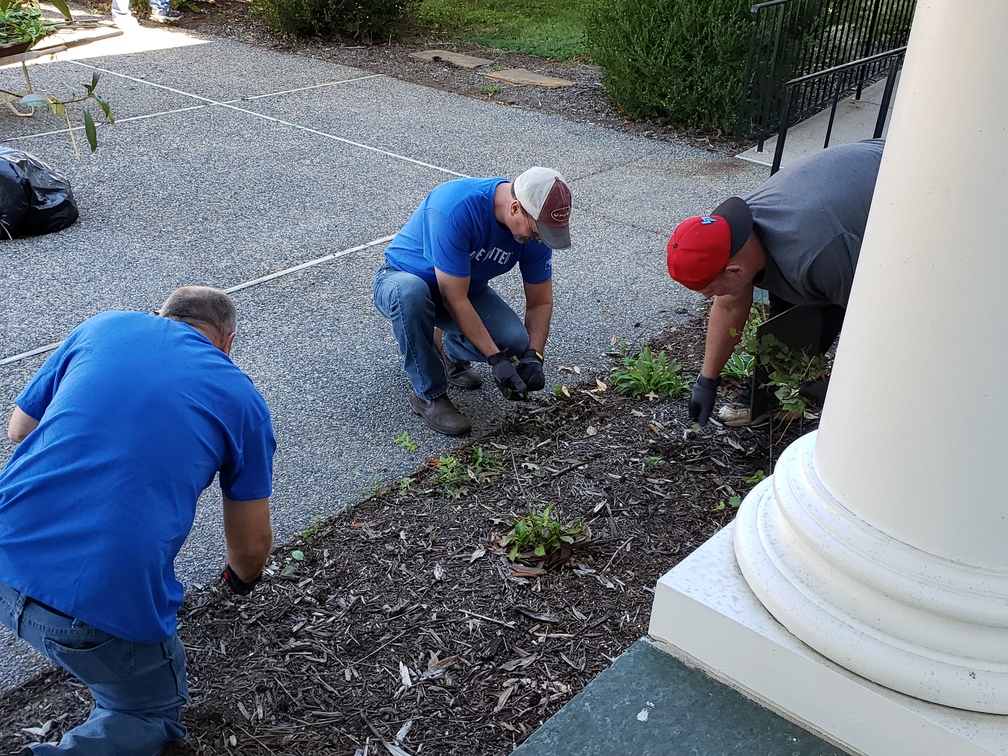 Eastman Chemical Volunteers Assisting with sprucing up the landscape at Piedmont Arts