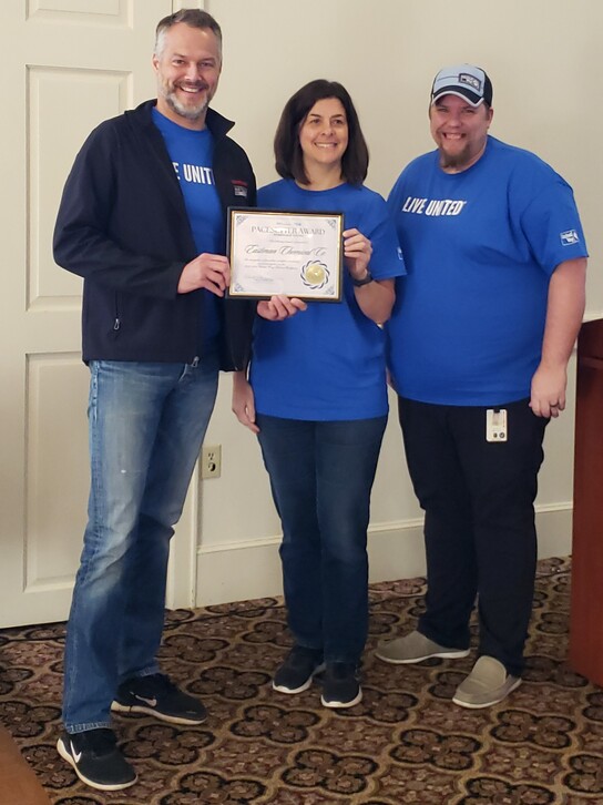 Kristoff, Karen, and Jonathan Accepting Eastman Chemical's Pacesetter Award