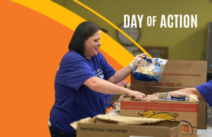 Day of Action - A local UWHCM volunteer preparing food boxes
